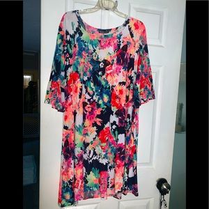Bright floral stretchy dress with pockets